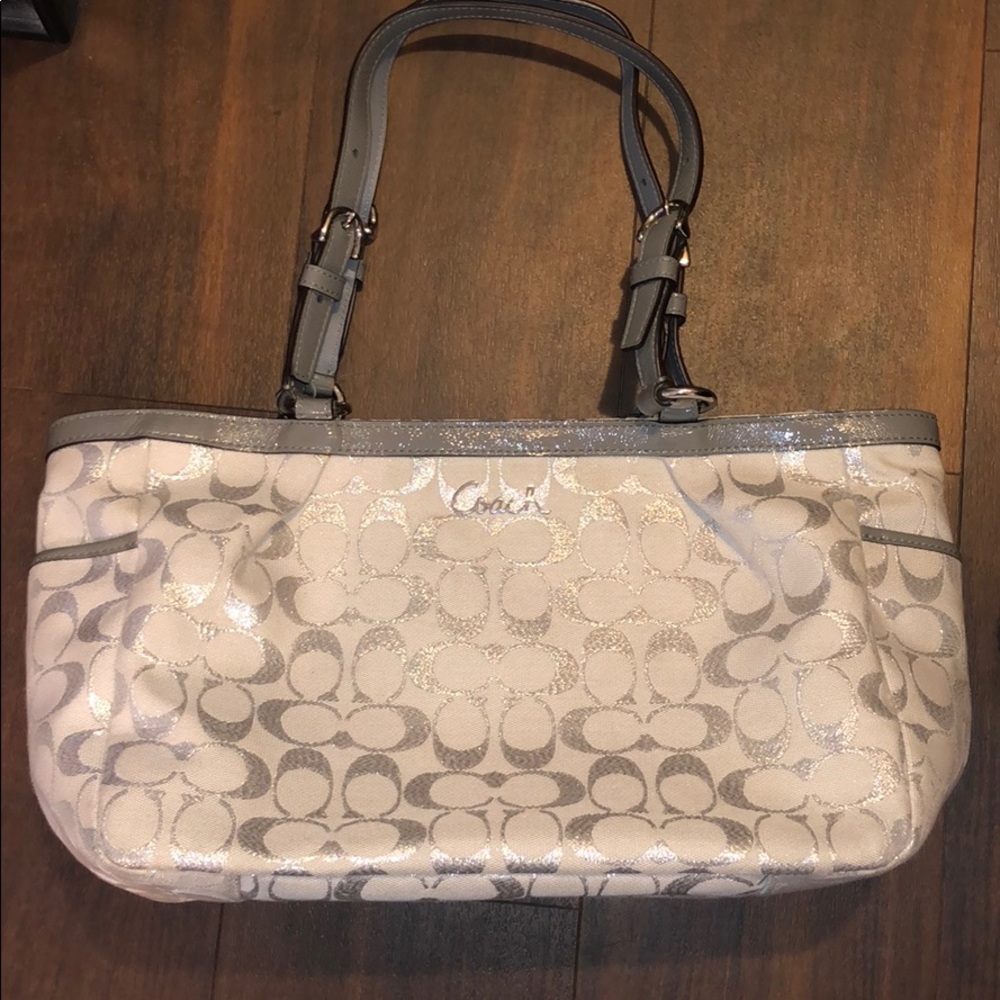 White and silver coach purse
